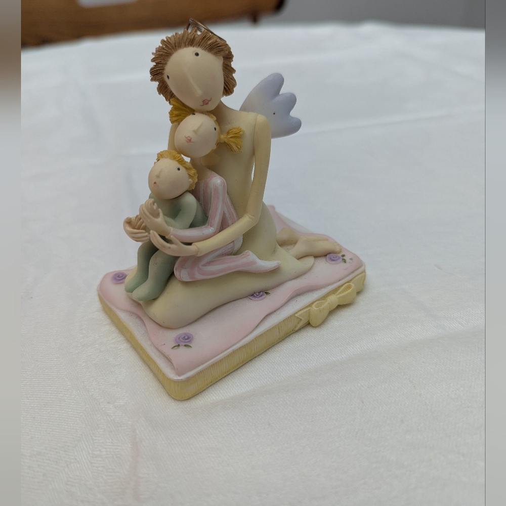 Demdaco  Pure of Heart Figurine . Claire Stoner Art. 3.5x2.5x 4 Inches. EUC.